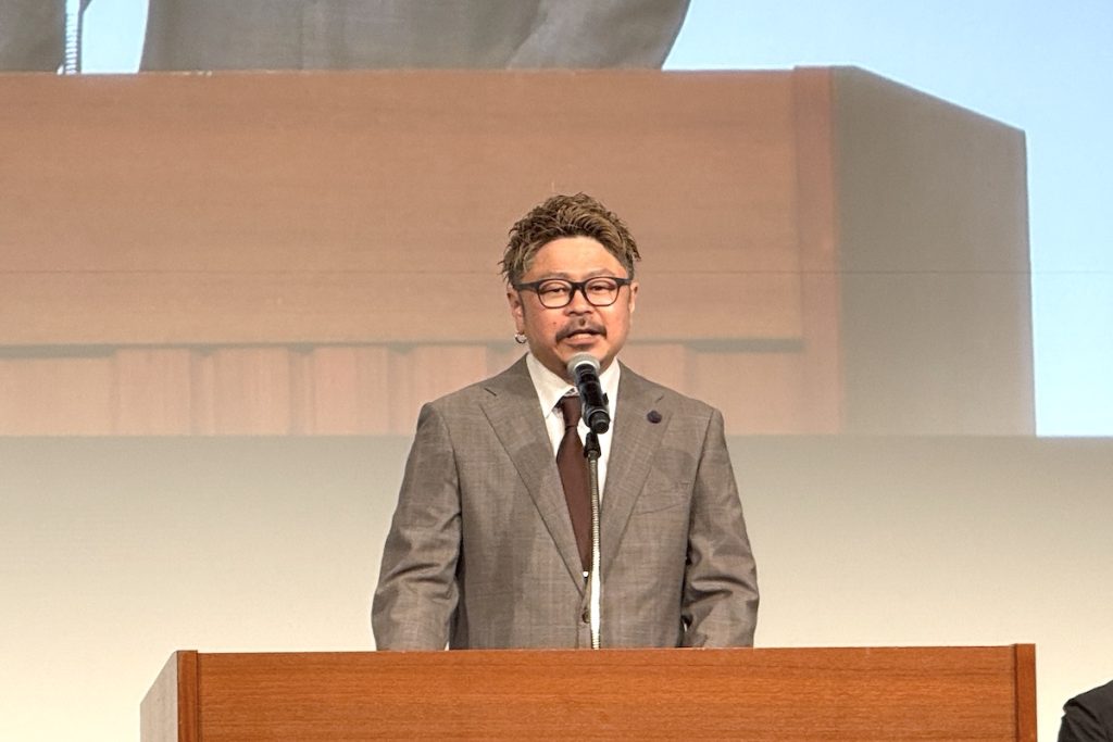 ティケイエス50周年記念式典_飯田営業部長.JPG